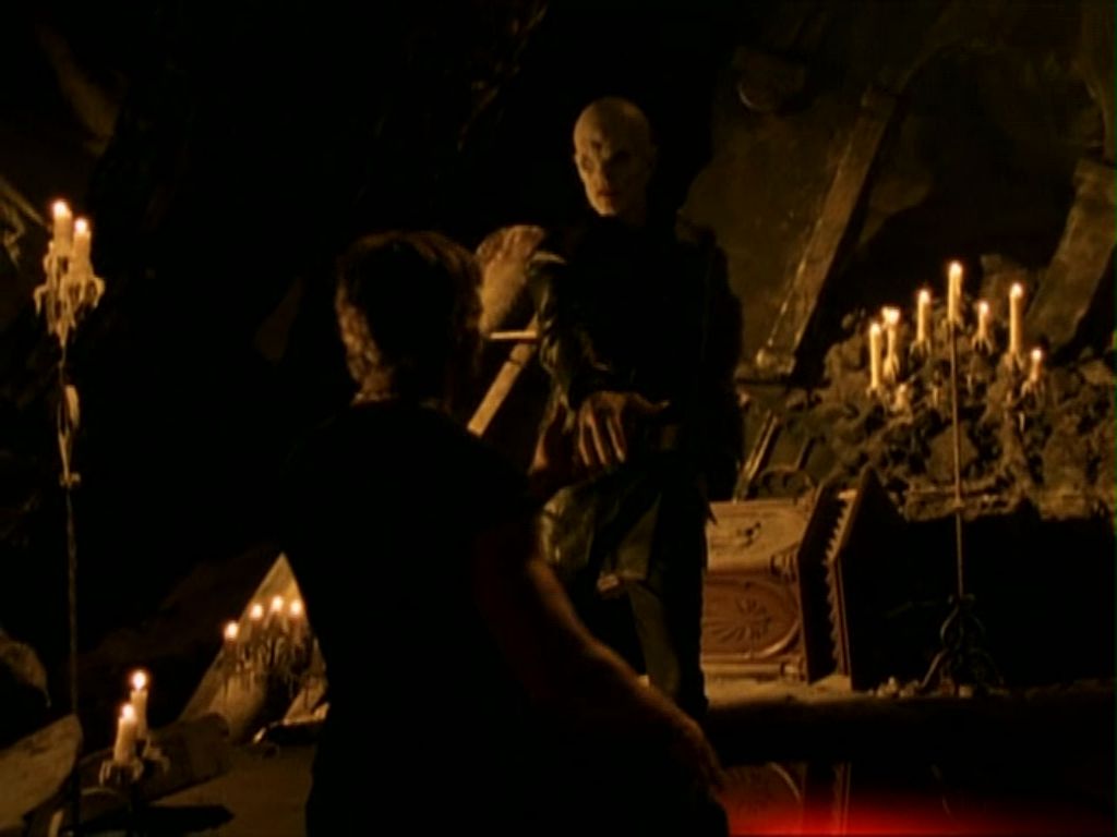 Luke kneeling in front of The Master