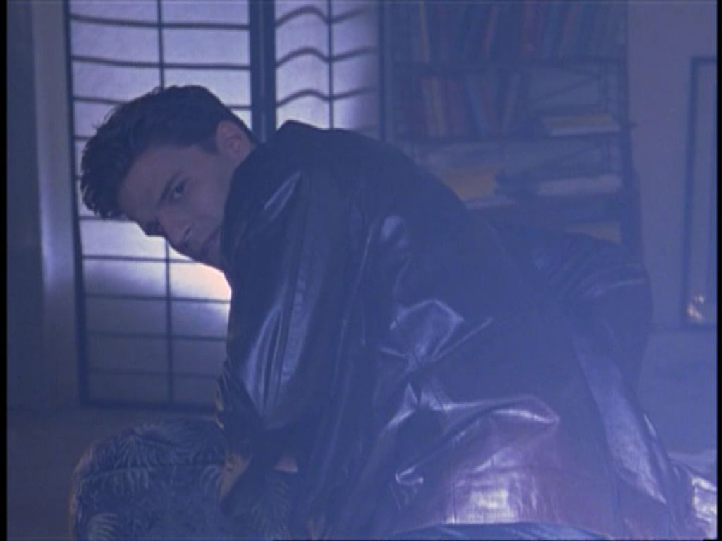 Angel recoiling from sunlight.