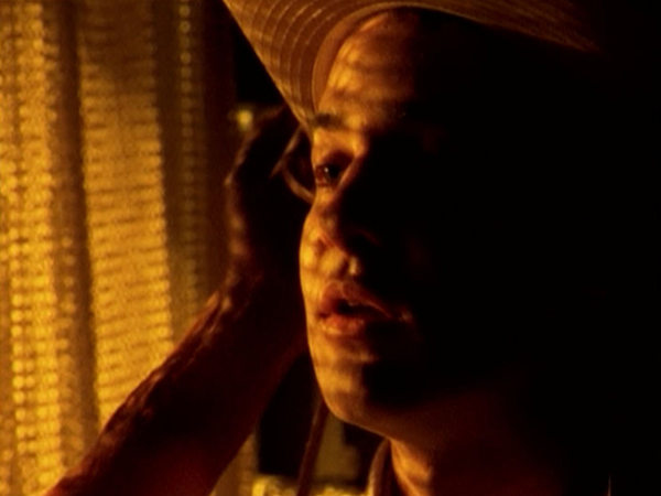 Jonathan's face is caressed by the Mummy