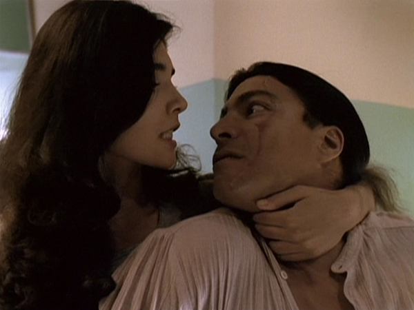 Ampata kills the Bodyguard in the school bathroom.