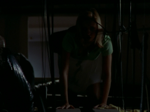 Buffy crawls around in the air ducts of the school.