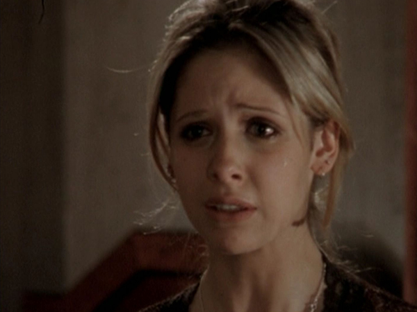 Buffy in tears after Angel's rejection.
