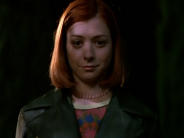 Willow stands over a vampire.